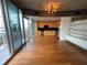 Spacious living area with hardwood flooring, an open floor plan, and a sliding glass door to a balcony at 155 S Court Ave # 1308, Orlando, FL 32801