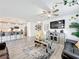 Stylish living room open to the kitchen, complete with modern furnishings at 16588 Centipede St, Clermont, FL 34714