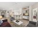 Inviting living room with sleek floors, stylish seating and lots of space at 16621 Caribbean Breeze Way, Clermont, FL 34714
