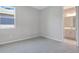 Bright bedroom with carpet floors and attached bathroom at 1737 Carnelian St, Deland, FL 32720