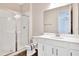 Bathroom featuring a glass shower, sink with white cabinets, and a toilet at 1741 Carnelian St, Deland, FL 32720