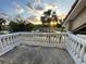 Balcony with lake view at sunset at 1750 Saint Tropez Ct, Kissimmee, FL 34744