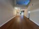 Spacious living room with hardwood floors, high ceilings and a view to the kitchen at 1750 Saint Tropez Ct, Kissimmee, FL 34744