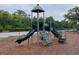 Outdoor playground area featuring a slide and climbing structure for enjoyment and activity at 1750 Saint Tropez Ct, Kissimmee, FL 34744