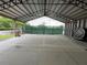 Outdoor recreational tennis court in the community offering a space for sports and exercise activities at 1750 Saint Tropez Ct, Kissimmee, FL 34744