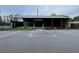 Exterior shot of KBAY Town Hall with parking in front, offering a convenient community gathering place at 1750 Saint Tropez Ct, Kissimmee, FL 34744