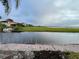Water view with a boat dock that enhances the beauty of the serene waterway at 1750 Saint Tropez Ct, Kissimmee, FL 34744