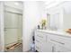 Well-lit bathroom showcasing a glass-enclosed shower and a quartz countertop vanity at 2031 Ludlow Ln # 3303, Orlando, FL 32839