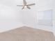 Carpeted bedroom featuring a ceiling fan and a window at 2031 Ludlow Ln # 3303, Orlando, FL 32839
