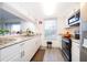 Modern kitchen with stainless steel appliances, granite countertops, and ample cabinet space at 2031 Ludlow Ln # 3303, Orlando, FL 32839