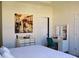 Bedroom featuring a vanity with lighted mirror, dresser, and contemporary decor at 2057 Celebration Blvd, Celebration, FL 34747