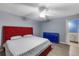 Cozy bedroom with modern light fixture, ceiling fan, and lots of natural light at 2081 N Normandy Blvd, Deltona, FL 32725