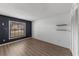 Large bedroom with wood-look flooring, plenty of natural light, and lots of closet space at 2081 N Normandy Blvd, Deltona, FL 32725