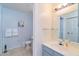 Bright bathroom with a single sink vanity and plenty of natural light at 2610 Lodi Cir # 104, Kissimmee, FL 34746