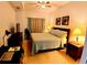 Cozy bedroom with a comfortable bed and ample natural light at 2610 Lodi Cir # 104, Kissimmee, FL 34746