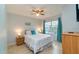 Comfortable bedroom with a ceiling fan, and a full size bed at 2610 Lodi Cir # 104, Kissimmee, FL 34746