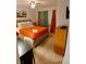 Comfortable bedroom with a soft bed, side table and a modern lamp at 2610 Lodi Cir # 104, Kissimmee, FL 34746