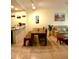 Open dining area with bench seating, seamlessly connecting the living spaces at 2610 Lodi Cir # 104, Kissimmee, FL 34746