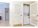 Convenient laundry area with a stacked washer and dryer at 2610 Lodi Cir # 104, Kissimmee, FL 34746
