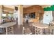 Outdoor Tiki Bar with tables and chairs offering a relaxed atmosphere for residents at 2610 Lodi Cir # 104, Kissimmee, FL 34746