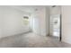 Cozy bedroom with neutral walls, a convenient closet, and carpet flooring; a comfortable retreat within the house at 2872 Lingo Ln, Orlando, FL 32822