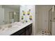 Cheerful bathroom with double sinks, Minion-themed wall decor, and a bright, clean aesthetic at 4213 Paragprah St, Kissimmee, FL 34746