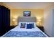 Bright, vibrant bedroom with yellow walls, Marvel-themed decor, and a comfortable, inviting feel at 4213 Paragprah St, Kissimmee, FL 34746