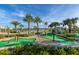 Community miniature golf course with palm trees and landscaping at 4213 Paragprah St, Kissimmee, FL 34746
