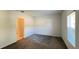 Bedroom with a window and a door leading to a tiled room at 4357 Babbling Brook Way, Kissimmee, FL 34746