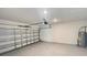 Garage with ample room for parking and storage and an automatic garage door opener at 4357 Babbling Brook Way, Kissimmee, FL 34746