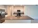 Beautiful kitchen featuring a large island with a sink and breakfast bar at 4357 Babbling Brook Way, Kissimmee, FL 34746