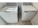 Efficient laundry area featuring a GE washer and dryer with modern controls and features at 4357 Babbling Brook Way, Kissimmee, FL 34746