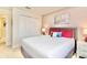 Comfortable bedroom with a double bed, soft lighting, and cozy decor at 4888 Romeo Cir, Kissimmee, FL 34746