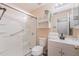 Functional bathroom featuring a shower, toilet, and vanity with sink and storage at 5101 Staniard Dr, Kissimmee, FL 34746