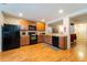 Functional kitchen with ample counter space and stainless steel appliances, perfect for culinary enthusiasts at 5101 Staniard Dr, Kissimmee, FL 34746
