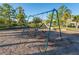 Well-maintained playground with swings and a slide, providing fun activities for in the community at 5101 Staniard Dr, Kissimmee, FL 34746