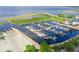 Marina with a view of the docks and boats with lush green trees in the background at 514 Massachusetts Ave, St Cloud, FL 34769