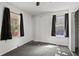 Bedroom with two windows, offering plenty of natural light and space at 514 Massachusetts Ave, St Cloud, FL 34769