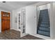 View of front door, stairs, and french doors leading to another room at 514 Massachusetts Ave, St Cloud, FL 34769
