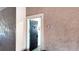 Condo entrance featuring the blue door with trim detail and unit number 106 sign at 5560 Metrowest Nw Blvd # 106, Orlando, FL 32811