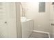Laundry room featuring a full size washer and dryer and metal shelving at 5560 Metrowest Nw Blvd # 106, Orlando, FL 32811