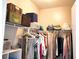 Spacious walk-in closet with ample storage space, shelves, and hanging racks at 5560 Metrowest Nw Blvd # 106, Orlando, FL 32811