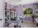 Bright craft room with ample storage, a large window overlooking green space, and overhead lighting at 6340 Nelms E Rd, Lakeland, FL 33811