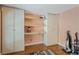 Bedroom featuring built-in storage cabinets and shelving, offering ample storage space at 6340 Nelms E Rd, Lakeland, FL 33811