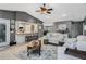 Open-concept living room featuring a breakfast bar and seamless flow to the kitchen, ideal for modern living at 6340 Nelms E Rd, Lakeland, FL 33811
