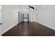 Bright bedroom with dark wood flooring, a ceiling fan, and a window at 8374 Bowden Way, Windermere, FL 34786