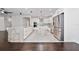 Spacious kitchen featuring dual islands, stainless steel appliances, white cabinetry, and two-tone flooring at 8374 Bowden Way, Windermere, FL 34786