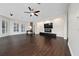 Expansive living area with modern decor, hardwood floors, and large windows at 8374 Bowden Way, Windermere, FL 34786