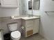Standard bathroom features a single sink vanity with a mirror and white fixtures for a clean design at 8907 Legacy Ct # 14 205, Kissimmee, FL 34747