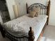 Bedroom featuring a traditional bed frame, a neutral color palette and bright natural lighting at 8907 Legacy Ct # 14 205, Kissimmee, FL 34747